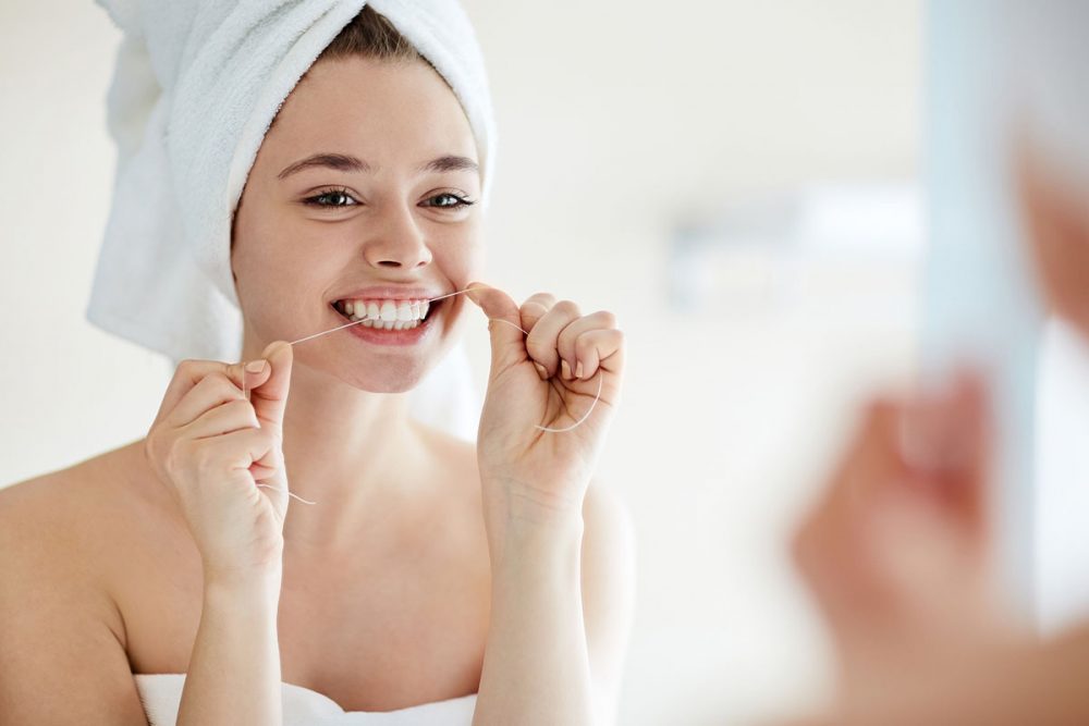 Do I Need to Floss or Not? Cosmetic Dentist Weighs in on Flossing Controversy